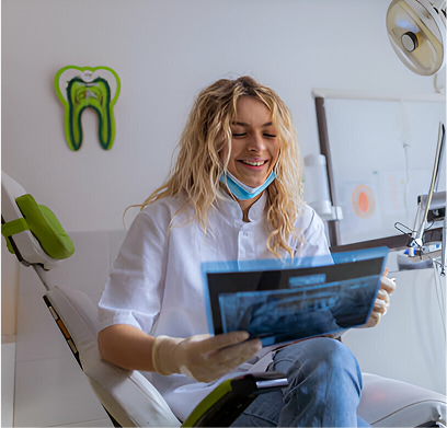 Smiling dental team at Nodemed posing together in a modern treatment room
